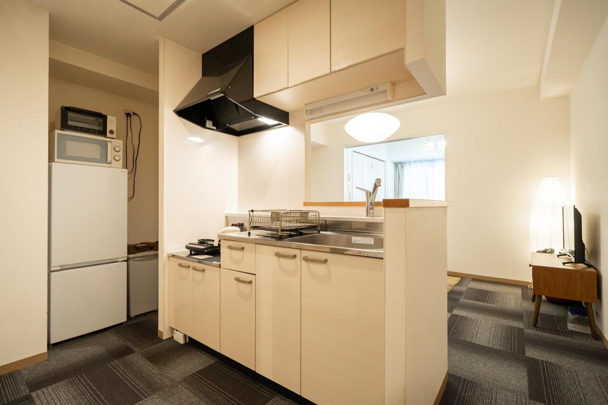 Ferienwohnung Tsubaki Garden Sapporo Zimmer foto
